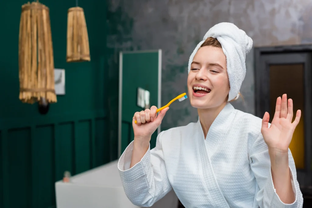 Soft toothbrush and oral care products for reducing post cleaning pain
